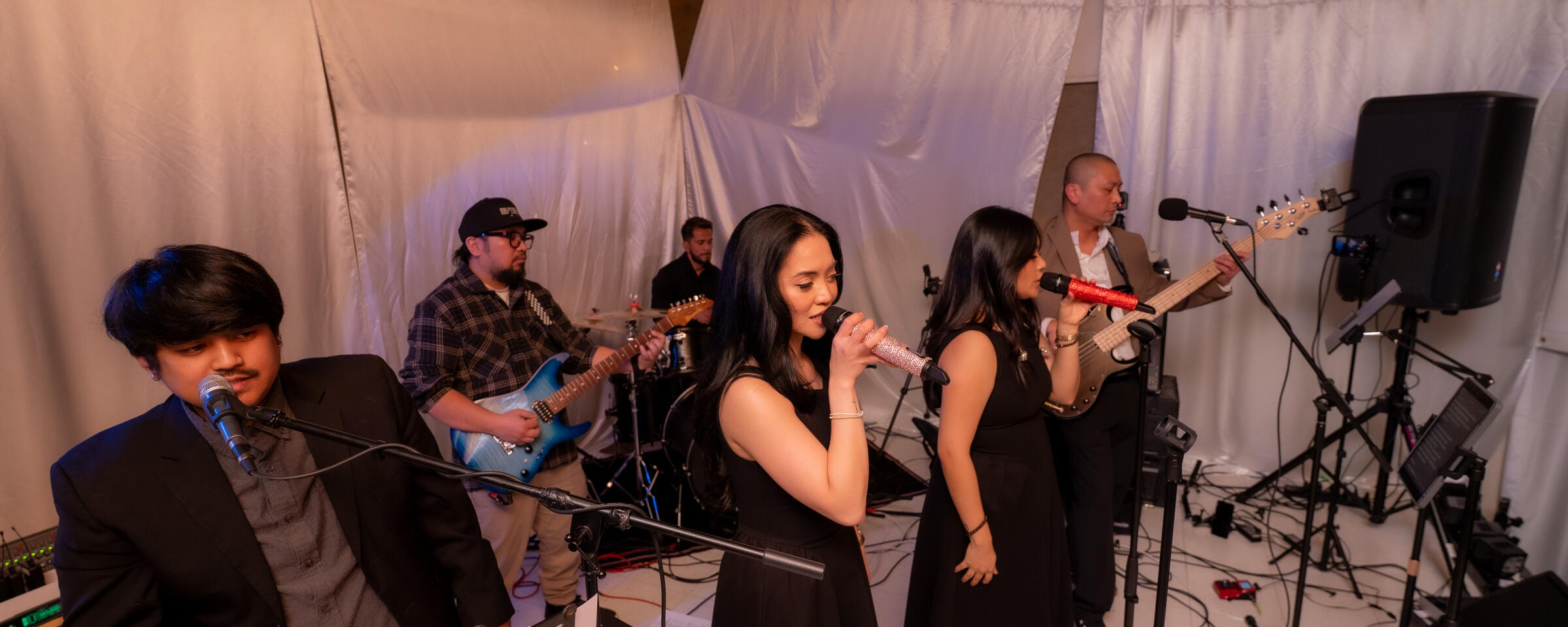D'ERA Party Band playing at a wedding reception